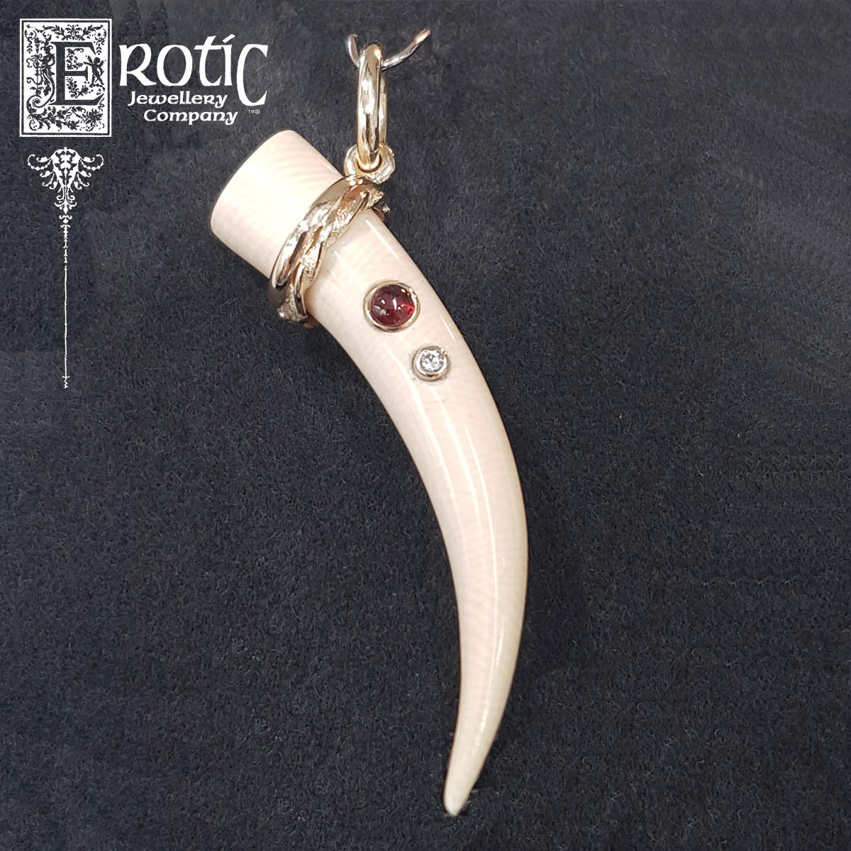 Mammoth tusk pendant with 9ct yellow gold, garnet and diamond. Handmade by Paul Amey