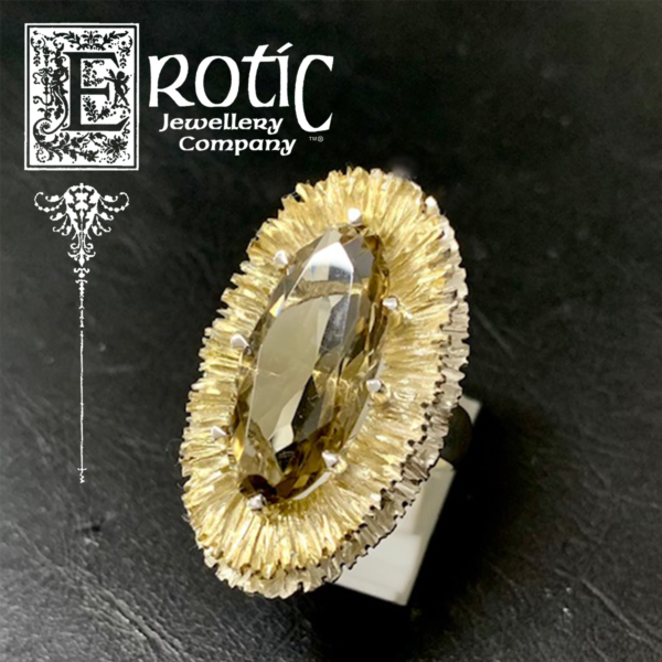 Sterling silver ring with carnation setting with 24ct gilt on top petal with natural oval smokey quartz handmade by Paul Amey