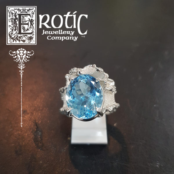 Swiss blue topaz silver molten edge ring handmade by Paul Amey with his signature texture finish