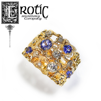 Tanzanite Dress Ring featuring gold lace band and diamonds, handmade by Paul Amey