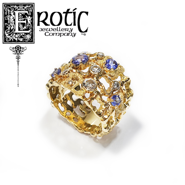 Tanzanite Dress Ring featuring gold lace band and diamonds, handmade by Paul Amey