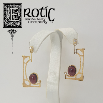 9ct Gold art deco stud earrings featuring natural garnet and diamonds. Handmade by Paul Amey.