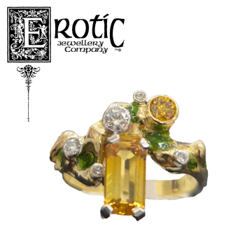 Yellow sapphire and diamond ring handmade by Paul Amey.